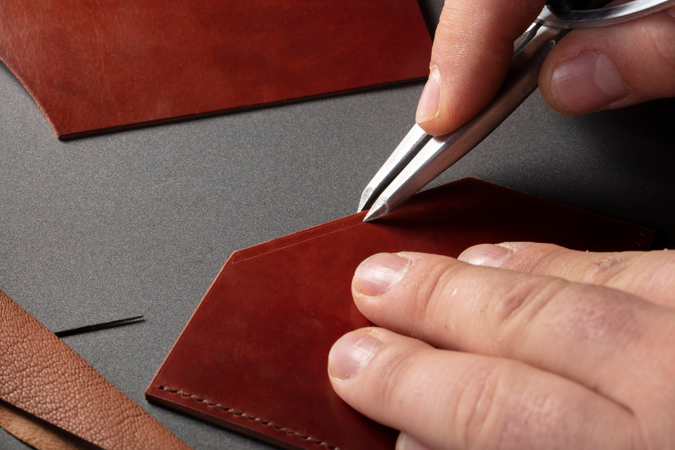 The process of making leather goods.